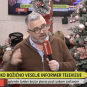 Dragan J. Vučićević drži mikrofon i priča na proslavi Božića u studiju