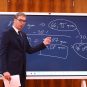 Aleksandar Vučić ispred table ispisane ekonomskim pokazateljima