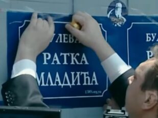 Aleksandar Vučić lepi plakat sa natpisom